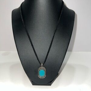 Elegant Silver and Turquoise Pendant Necklace